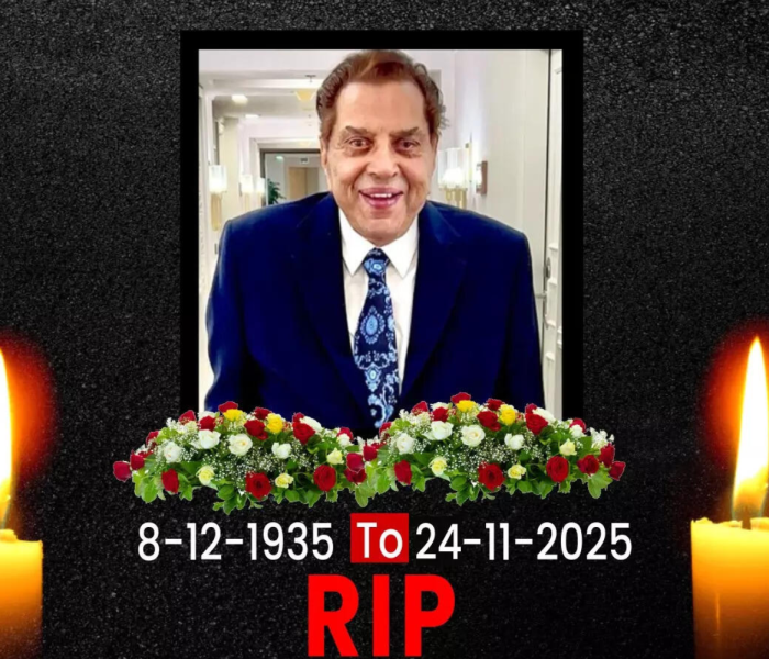 Black-and-white portrait of veteran actor Dharmendra, smiling softly