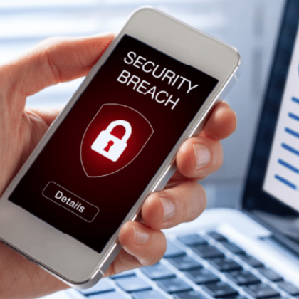 Smartphone with digital shield and hacking indicators representing mobile security attacks